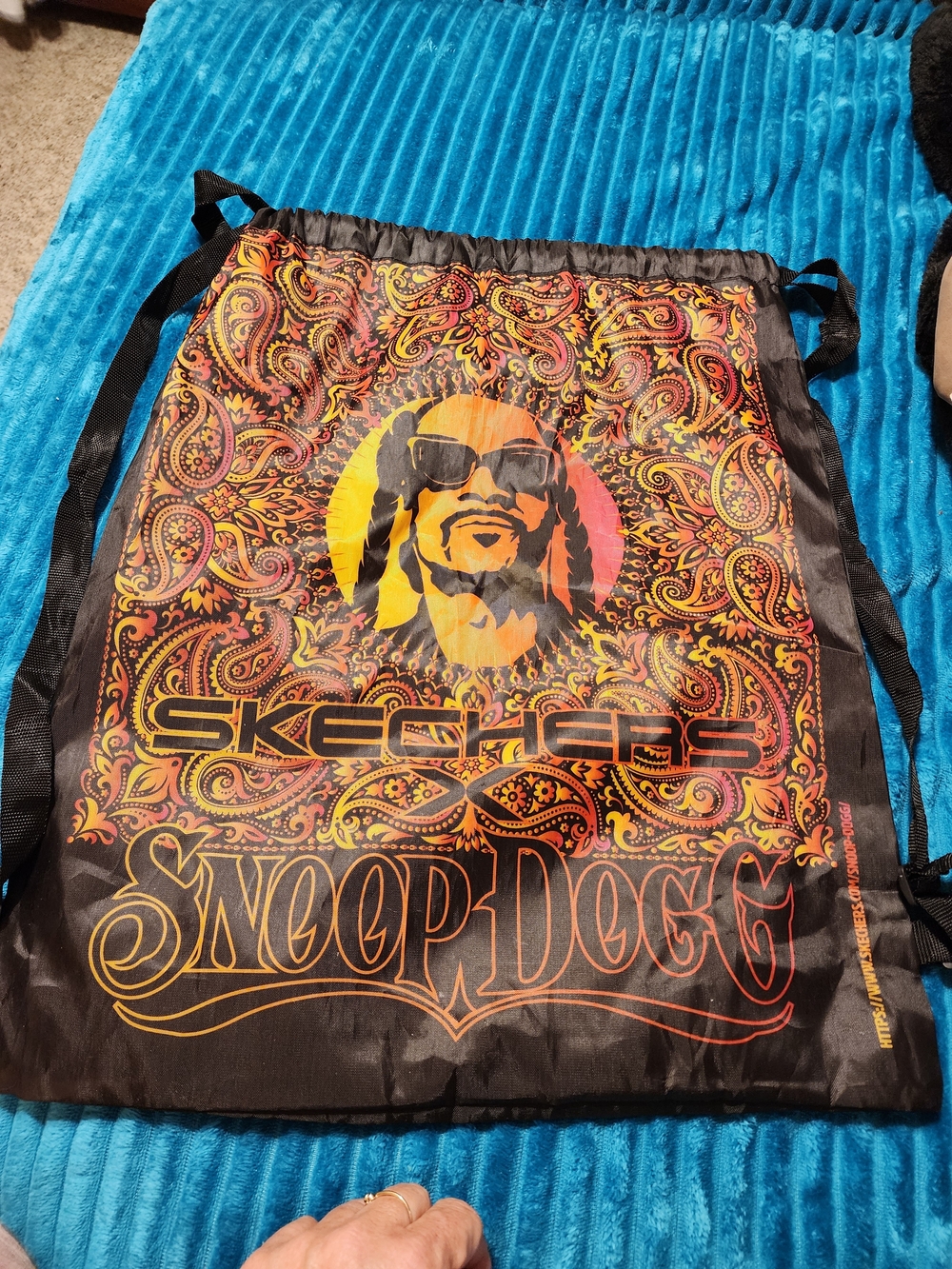 Skechers Snoop  Dog Black Drawstring Backpack with Orange and Yellow Paisley